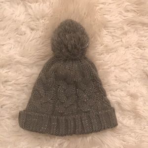 Cableknit grey and silver pom pom hat
